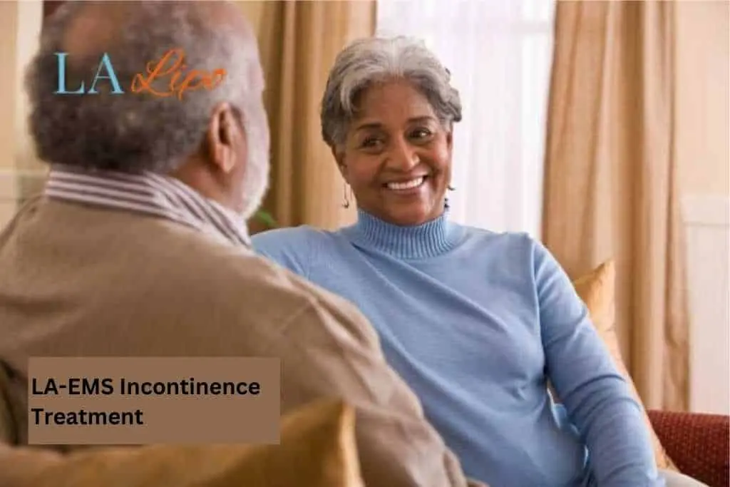 Couple sat smiling at each other - LA-EMS treatment Luton