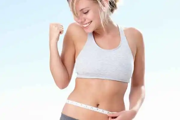 woman happy after fat reduction treatment Luton