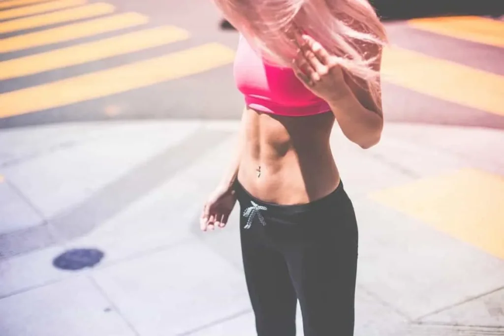 Woman with toned stomach after LA-EMS Body Sculpting Treatment Luton